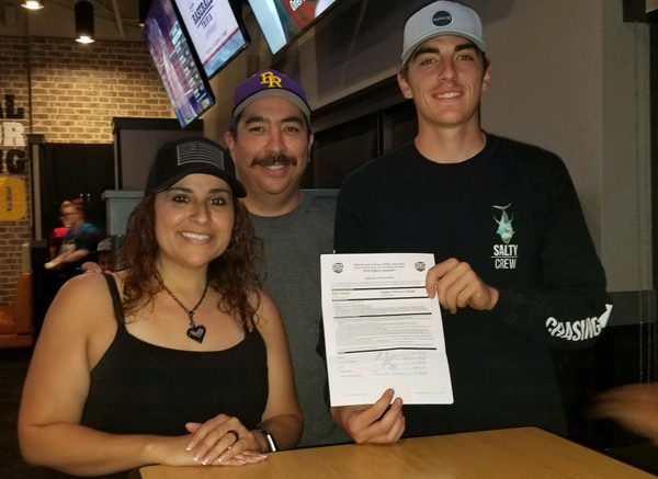 Seth Chavez Signs Letter Of Intent To Play Baseball For Eastern Arizona College. Pictured (from left to right) Seth's Mother - Denys Chavez, Seth's Father - Greg Chavez Jr., and Seth Chavez