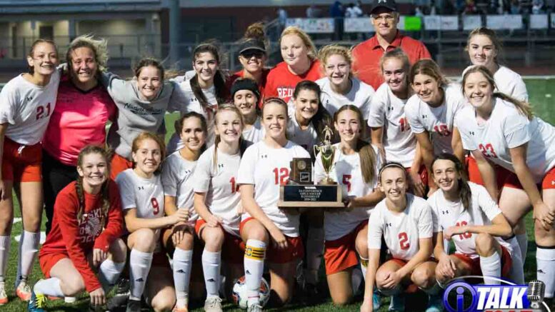 St John's Lady Redskins Pose With the 2020 2A State Soccer Runner-up Trophy.