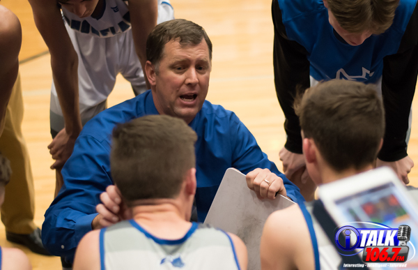Snowflake Head Coach Andy Wood Huddles with his team during a time out in the 2020 3A State Play-offs.