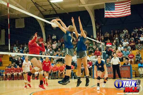 Snowflake Sophomore, Reagan Olsen #4 blocks a Monument Valley hit during the 2018 3A State Volleyball Quarterfinals. The Lobos defeated the Mustangs in 3 straight sets to advance to the Semifinals. Photo Credit: Camden Smith - iTalk 106.7 FM