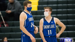 Snowflake Lobo Seniors Stewart West #24 and Gannon Larson #11 talk during the Snowflake vs Show Low Game on January 26, 2021. Snowflake beat Show Low 56-47.