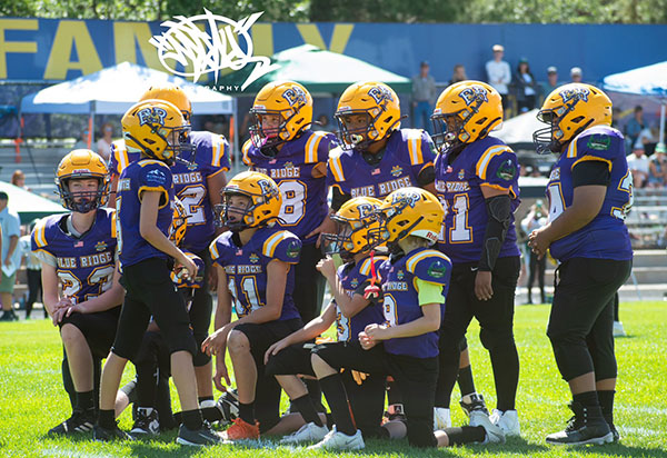 Minors NAYFL Blue Ridge Yellowjackets Huddle during a regular season game. Photo Credit: Nachu LIonel - Facebook Link: https://www.facebook.com/photo/?fbid=1499332881256403&set=pcb.1499334804589544
